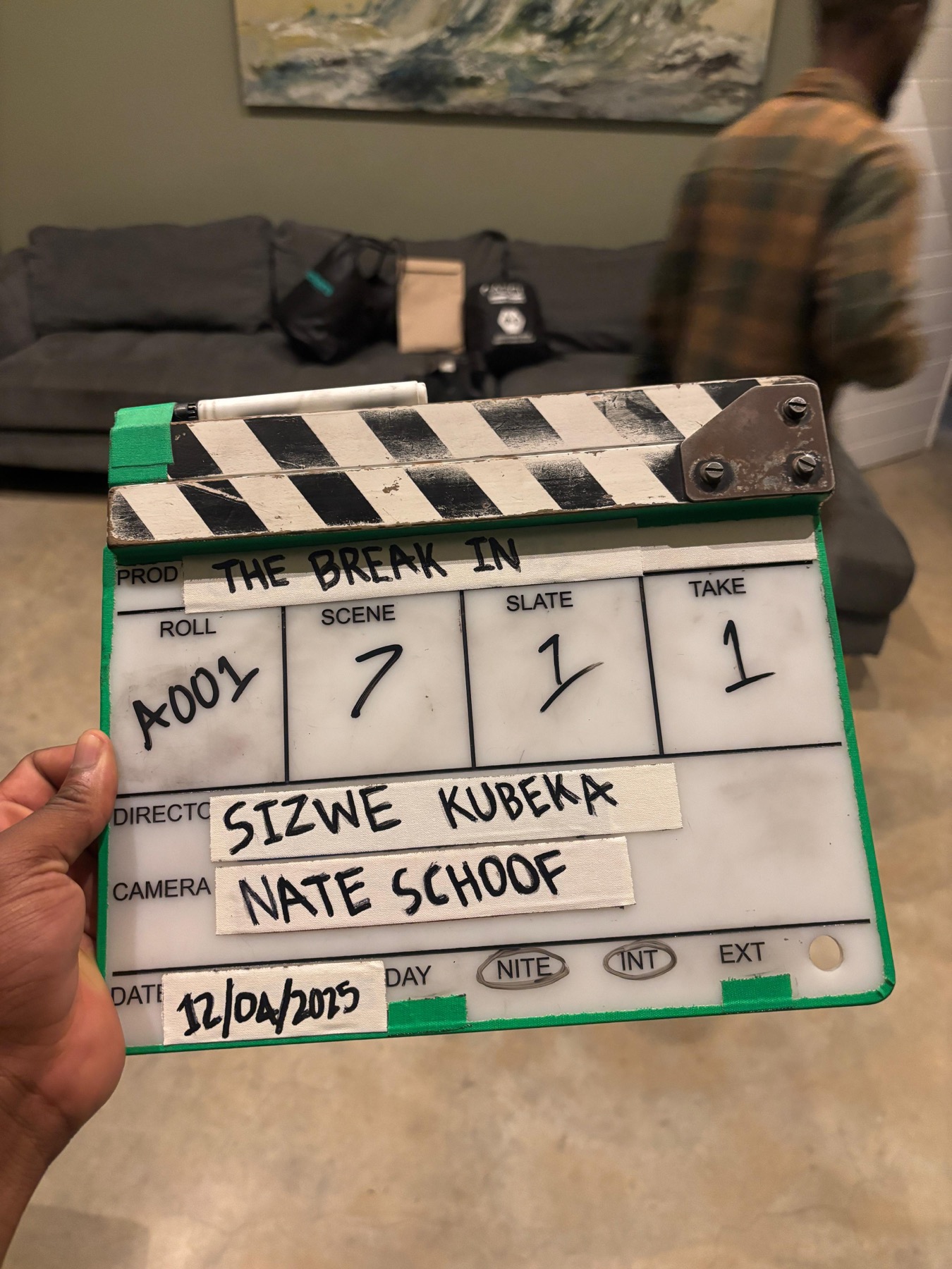 The Break-In clapperboard on a Black Orbit Studios set